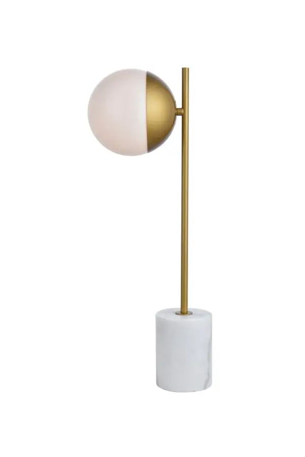 Refined style with a practical design, Eclipse Table Lamp bring cosmopolitan sophistication anywhere, especially to an entryway, office, bathroom, bedroom, or kitchen. The smooth marble base anchors the table lamp and comes in a brass finish. A touch of color on top of the frosted white spherical glass shade brings character to this classic style. Living in the big city has never been this easy. Collection: Eclipse Rooms: entryway, office, bathroom, bedroom, or kitchen Finish: Brass and frosted white Glass: Frosted White Width: 6.00" Height: 22.00" Length: 8.50" Weight: 8.00 lb Wire: 72" Clear Number of Bulbs: 1 Maximum Wattage: 40.00 W Bulb Type: E26 Bulb Base: E26 Voltage: 110.00 V Material: Metal and Glass and Marble Country of Origin: China Safety Listing: ETL Safety Rating: UL,ULC Switch: in line rocker switch Title 20 Manufacturer Warranty: 1 year limited Spec Sheet