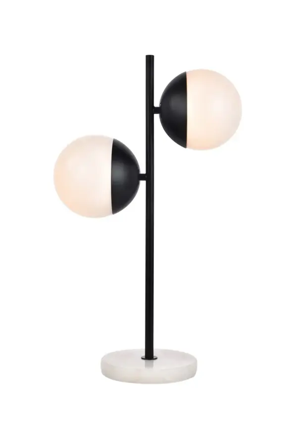 Refined style with a practical design, Eclipse Table Lamp bring cosmopolitan sophistication anywhere, especially to an entryway, office, bathroom, bedroom, or kitchen. The smooth marble base anchors the table lamp and comes in a black finish. A touch of color on top of the frosted white spherical glass shade brings character to this classic style. Living in the big city has never been this easy. Collection: Eclipse Rooms: entryway, office, bathroom, bedroom, or kitchen Finish: Black and frosted white Glass: Frosted White Width: 7.00" Height: 23.00" Length: 13.50" Weight: 7.00 lb Wire: 72" Clear Number of Bulbs: 2 Maximum Wattage: 40.00 W Bulb Type: E26 Bulb Base: E26 Voltage: 110.00 V Material: Metal and Glass and Marble Country of Origin: China Safety Listing: ETL Safety Rating: UL,ULC Switch: in line rocker switch Title 20 Manufacturer Warranty: 1 year limited Spec Sheet