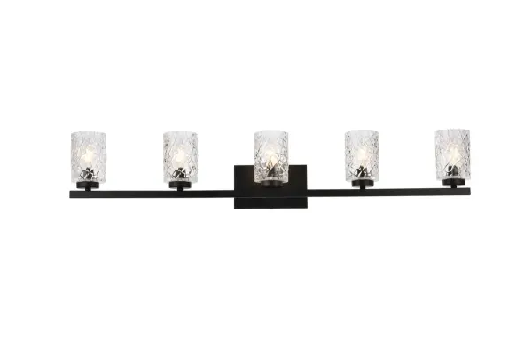 In all of its auspicious glory, the Cassie collection wall lamp will shine its felicitous light for you. As the light passes through the shade, it dances around with the shadows and puts a spotlight in your room. Whether it is in your entryway or bathrooms, this 1-light wall lamp will surely please you and your guests. Collection: Cassie Rooms: Dining room, kitchen, living room, entry way Finish: Black and Clear Shade Glass: Clear Width: 5.50" Height: 7.70" Length: 41.50" Weight: 10.00 lb Extension from Wall: 5.50" Wire: 6" Black and White Canopy: 7.9"x4.7"x0.8" Number of Bulbs: 5 Maximum Wattage: 40.00 W Bulb Type: E-12 Bulb Base: E12 Dimmable Voltage: 110.00 V Material: Metal and Glass Country of Origin: China Safety Listing: ETL Safety Rating: Damp Title 20 Title 24 Manufacturer Warranty: 1 year limited Spec Sheet