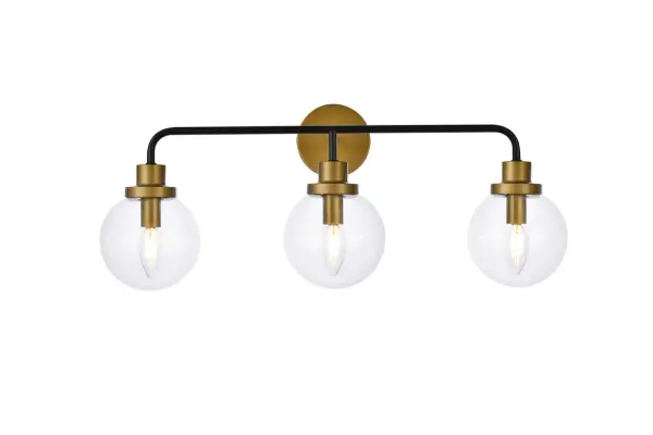 In all of its auspicious glory, the Hanson collection wall lamp will shine its felicitous light for you. As the light passes through the shade, it dances around with the shadows and puts a spotlight in your room. Whether it is in your entryway or bathrooms, this 1-light wall lamp will surely please you and your guests. Collection: Hanson Rooms: Dining room, kitchen, living room, entry way Finish: Black and Brass and Clear Shade Glass: Clear Width: 8.00" Height: 11.70" Length: 28.00" Weight: 4.00 lb Extension from Wall: 8.00" Wire: 6" Black and White Canopy: 4.7"x4.7"x1" Number of Bulbs: 3 Maximum Wattage: 40.00 W Bulb Type: E12 Bulb Base: E12 Dimmable Voltage: 110.00 V Material: Metal and Aluminum and Glass Country of Origin: China Safety Listing: ETL Safety Rating: Damp Title 20 Title 24 Manufacturer Warranty: 1 year limited Spec Sheet