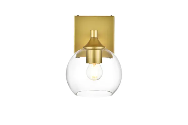 Defined by a sleek metal arm extends to suspend the clear pear-shaped glass shade. A contemporary stunner, it shows off the straight line details from the backplate and the streamline thick metal arm. Compatible with dimmers, so you'll have the right amount of light in any given time of the day. Completely versatile, you can place this wall light as an uplight or downlight. Rated for use in damp locations, this will work perfectly over a vanity in your bathroom. Collection: Foster Rooms: Bathroom Finish: Brass and Clear Glass: Clear Width: 6.00" Height: 9.00" Weight: 2.00 lb Extension from Wall: 8.00" Wire: 8" Black and White Canopy: 4.7"x4.7"x0.8" Number of Bulbs: 1 Maximum Wattage: 40.00 W Bulb Type: E26 Bulb Base: E26 Dimmable Voltage: 110.00 V Material: Iron and Glass Country of Origin: China Safety Listing: ETL Safety Rating: Damp Title 20 Title 24 Manufacturer Warranty: 1 year limited