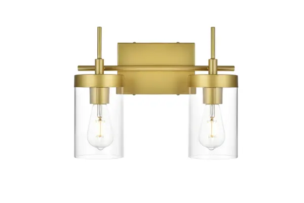 Defined by curved metal arm extends to suspend the clear bell glass shade. A contemporary stunner, it shows off the straight line details from the backplate and the streamline thin metal arm. Compatible with dimmers, so you'll have the right amount of light in any given time of the day. Completely versatile, you can place this wall light as an uplight or downlight. Rated for use in damp locations, this will work perfectly over a vanity in your bathroom. Collection: Benny Rooms: Bathroom Finish: Brass and Clear Glass: Clear Width: 14.00" Height: 11.00" Weight: 4.00 lb Extension from Wall: 6.00" Wire: 8" Black and White Canopy: 7.1"x4.7"x0.8" Number of Bulbs: 2 Maximum Wattage: 40.00 W Bulb Type: E26 Bulb Base: E26 Dimmable Voltage: 110.00 V Material: Iron and Glass Country of Origin: China Safety Listing: ETL Safety Rating: Damp Title 20 Title 24 Manufacturer Warranty: 1 year limited