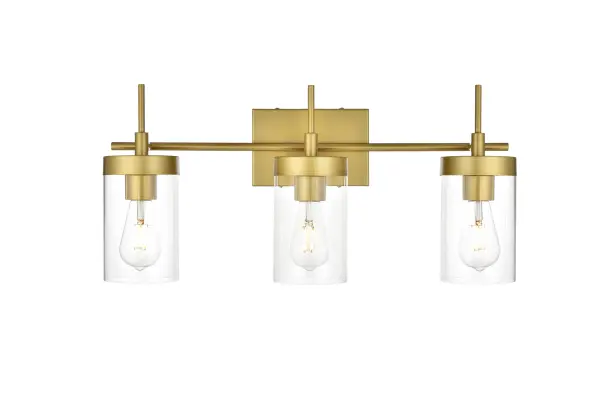 Defined by curved metal arm extends to suspend the clear bell glass shade. A contemporary stunner, it shows off the straight line details from the backplate and the streamline thin metal arm. Compatible with dimmers, so you'll have the right amount of light in any given time of the day. Completely versatile, you can place this wall light as an uplight or downlight. Rated for use in damp locations, this will work perfectly over a vanity in your bathroom. Collection: Benny Rooms: Bathroom Finish: Brass and Clear Glass: Clear Width: 24.00" Height: 11.00" Weight: 5.00 lb Extension from Wall: 6.00" Wire: 8" Black and White Canopy: 7.1"x4.7"x0.8" Number of Bulbs: 3 Maximum Wattage: 40.00 W Bulb Type: E26 Bulb Base: E26 Dimmable Voltage: 110.00 V Material: Iron and Glass Country of Origin: China Safety Listing: ETL Safety Rating: Damp Title 20 Title 24 Manufacturer Warranty: 1 year limited
