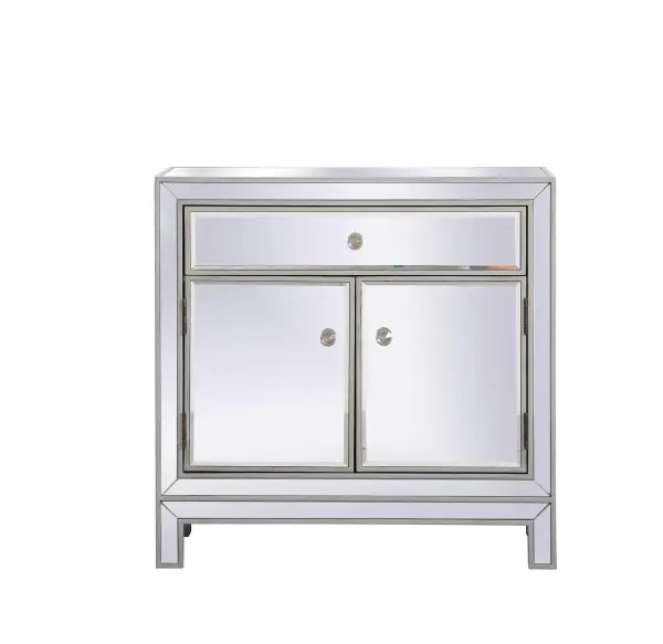 A perfect balance of contemporary style and practical utility, this chic one drawer, two doors mirror cabinet will enhance any room in your home. Featuring a hand paintedSilver finish, top quality mirror panels in distinctive mitered corner, jewel like crystal door knobs, it will provide you with stylish storage space you often need. Collection: Modern Rooms: living room Finish: Antique Silver Width: 13.50" Height: 28.25" Length: 28.50" Weight: 55.00 lb Country of Origin: China Manufacturer Warranty: 1 year limited Spec Sheet
