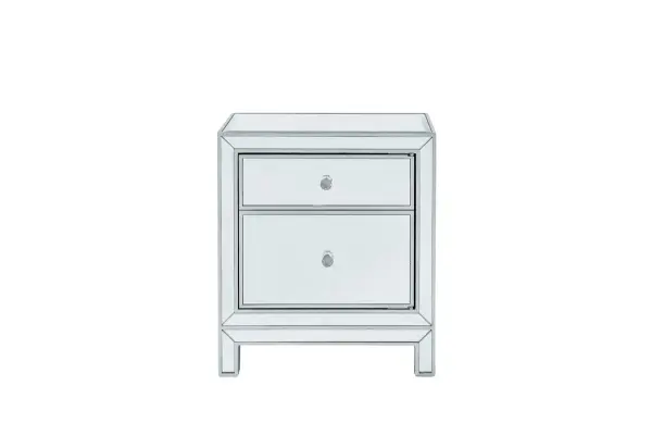 With its sleek lines and contemporary reflective appeal, this cabinet brings elegance and glamour. It provide ample storage space with strong shelving, jewel like crystal knobs, top quality mirror surfaces, and distinctive mitered corners. It combines function and style for any room in your home. FEATURES: Reflexion collection 1 door Storage shelf crystal door knobs Hand rubbed silver finish Beveled mirror panel Solid wood trim and legs Inside lining painted in silver PRODUCT DETAILS: Measurement L24xW16xH26" No assembly required Material in kiln-dried solid wood and engineered wood 1 year limited warranty. Collection: REFLEXION Rooms: living room, bedroom, office Finish: Antique Silver Width: 14.00" Height: 24.00" Length: 21.00" Weight: 40.00 lb Material: Solid wood and MDF Country of Origin: China Manufacturer Warranty: 1 year limited Spec Sheet