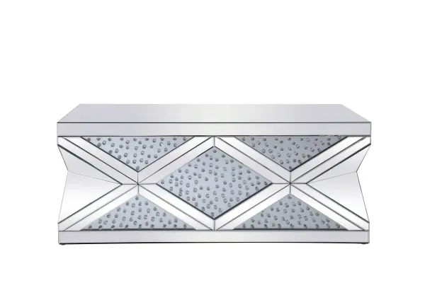 Glamourize your home and let your rooms sparkle with this coffee table exuding utmost elegance and modernity. The crisscrossing pattern creates an array of triangular and diamond shapes that has sparkling crystals embellished within clear class. The accent borders that creates the crisscrossing and top panels are all enveloped in clear beveled mirror panels that adds even more prestigious luxe. Host a dinner party and watch as your guests gather around this sparkling table with their glasses of wine and hors d'oeuvre, adorn it with fashionable magazines and important journals, inspire your guests with photography and textiles books—to put it simply, let this sparkling coffee table inspire conversations between you and your guests. Collection: Modern Rooms: living room Finish: clear mirror Crystal: clear Width: 47.50" Height: 19.00" Length: 29.00" Weight: 139.00 lb Country of Origin: China Manufacturer Warranty: 1 year limited Spec Sheet