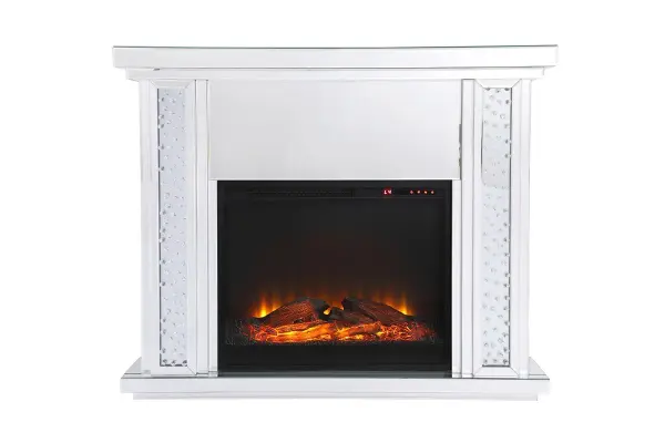 Live lavishly and sip on a glass of bubbly as the fire crackles in the wood log insert. The sparkling clear crystals embedded in the columns glisten and gleam with an air of leisurely beauty, while the mirror panels offer splendid grandeur. Create a scene of indulgence by adorning the mantle with your treasures--family portraits, prized works of art, or fragrant flowers. Collection: Modern Rooms: living room Finish: Clear Width: 13.00" Height: 38.50" Length: 47.50" Weight: 163.00 lb Material: MDF, mirror, metal, crystals Country of Origin: China Safety Listing: Dry Safety Rating: Dry Manufacturer Warranty: 1 year limited Spec Sheet