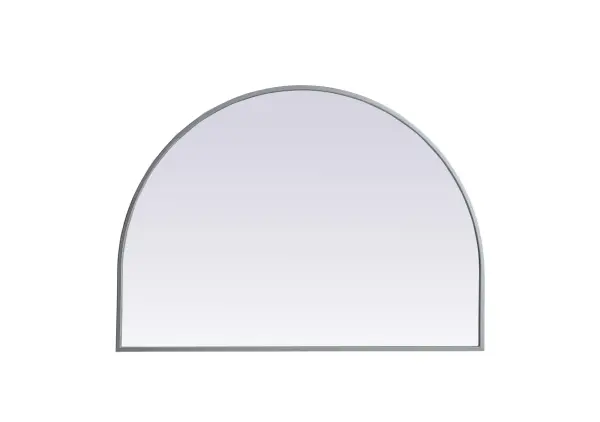 Instantly open up any space in your home with this minimalist wall-mounted mirror. Crafted of metal, this mirror strikes a round silhouette. Its slender, clean-lined frame sports a classic finish, while the glass mirror within features a flat, for a brilliant reflection, letting the light bounce off to expand your space. Designed in an arch shape, this metal-frame mirror showcases in the three available satin finishes in black, brass, or silver. Mount this work of art in any room of your choice for added visual impact. Collection: Ayra Finish: Silver Width: 33.00" Height: 24.00" Length: 24.00" Weight: 13.00 lb Material: iron and MDF Country of Origin: China Manufacturer Warranty: 1 year limited
