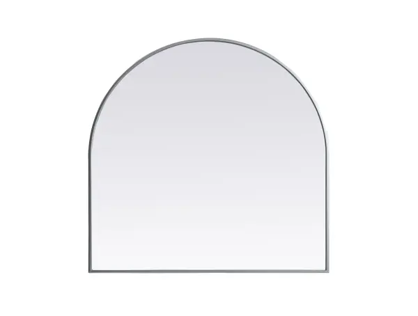 Instantly open up any space in your home with this minimalist wall-mounted mirror. Crafted of metal, this mirror strikes a round silhouette. Its slender, clean-lined frame sports a classic finish, while the glass mirror within features a flat, for a brilliant reflection, letting the light bounce off to expand your space. Designed in an arch shape, this metal-frame mirror showcases in the three available satin finishes in black, brass, or silver. Mount this work of art in any room of your choice for added visual impact. Collection: Ayra Finish: Silver Width: 36.00" Height: 36.00" Length: 36.00" Weight: 22.00 lb Material: iron and MDF Country of Origin: China Manufacturer Warranty: 1 year limited