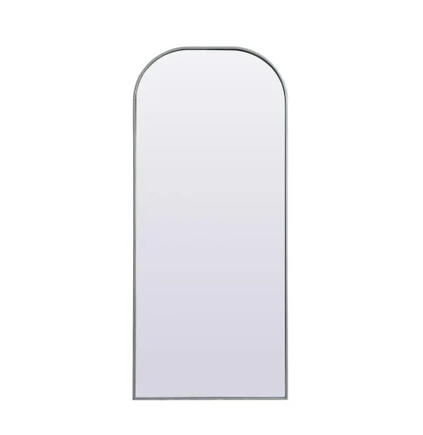 Elongated and modern, its curved profile looks great as a leaning mirror or a hanging mirror by a door. This ultra thin full-length mirror makes a practical addition to any room. Set in an iron frame, this sturdy mirror complements any room. Whether you want to create an illusion of extra space or use it as a functional accent, this mirror will make a big statement over your wall. Comes in three satin finishes in black, brass, or silver. Collection: Blaire Finish: Silver Width: 28.00" Height: 66.00" Length: 66.00" Weight: 34.00 lb Material: iron and MDF Country of Origin: China Manufacturer Warranty: 1 year limited