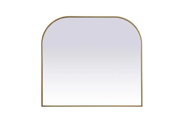 Over the mantel mirror serves an ideal décor on the mantel because it acts as an anchor piece that you can accentuate around with smaller accessories. The reflective qualities of the mirror can also make a space look bigger and brighter since it bounces light coming from your light sources. Designed with square bottom edges and rounded top, this mirror gives an unexpected twist to your typical mirror look. Select from three satin finishes in black, brass, or silver. Collection: Blaire Finish: Brass Width: 42.00" Height: 38.00" Length: 38.00" Weight: 28.00 lb Material: iron and MDF Country of Origin: China Manufacturer Warranty: 1 year limited
