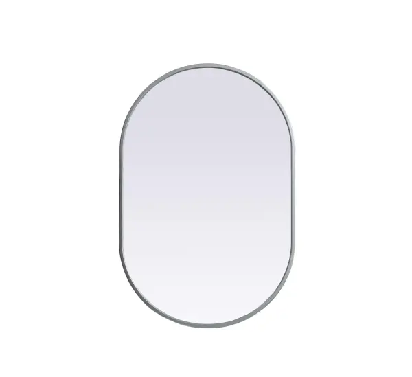 Instantly open up any space in your home with this minimalist wall-mounted mirror. Crafted of metal, this mirror strikes a pill-shaped silhouette. Its slender, clean-lined frame sports a classic finish, while the glass mirror within features a flat, for a brilliant reflection, letting the light bounce off to expand your space. Designed in a pill shape, this metal-frame mirror showcases in the three available satin finishes in black, brass, or silver. Mount this work of art in any room of your choice for added visual impact. Collection: Asha Finish: Silver Width: 20.00" Height: 30.00" Length: 30.00" Weight: 11.00 lb Material: iron and MDF Country of Origin: China Manufacturer Warranty: 1 year limited