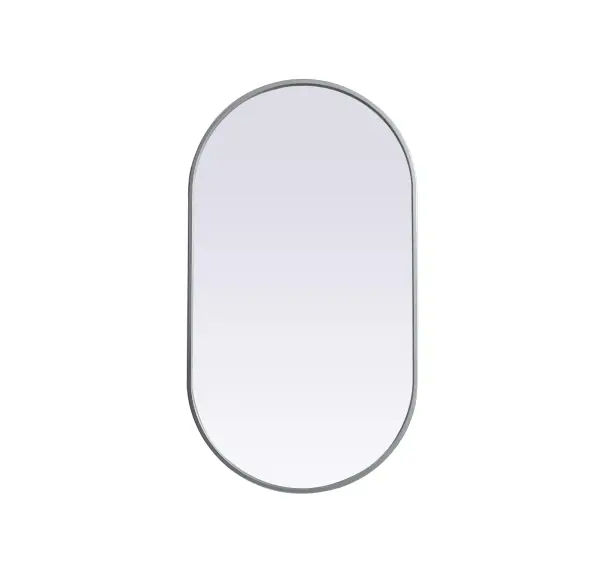 Instantly open up any space in your home with this minimalist wall-mounted mirror. Crafted of metal, this mirror strikes a pill-shaped silhouette. Its slender, clean-lined frame sports a classic finish, while the glass mirror within features a flat, for a brilliant reflection, letting the light bounce off to expand your space. Designed in a pill shape, this metal-frame mirror showcases in the three available satin finishes in black, brass, or silver. Mount this work of art in any room of your choice for added visual impact. Collection: Asha Finish: Silver Width: 20.00" Height: 36.00" Length: 36.00" Weight: 13.00 lb Material: iron and MDF Country of Origin: China Manufacturer Warranty: 1 year limited
