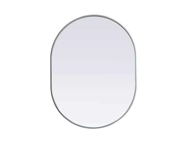 Instantly open up any space in your home with this minimalist wall-mounted mirror. Crafted of metal, this mirror strikes a pill-shaped silhouette. Its slender, clean-lined frame sports a classic finish, while the glass mirror within features a flat, for a brilliant reflection, letting the light bounce off to expand your space. Designed in a pill shape, this metal-frame mirror showcases in the three available satin finishes in black, brass, or silver. Mount this work of art in any room of your choice for added visual impact. Collection: Asha Finish: Silver Width: 30.00" Height: 40.00" Length: 40.00" Weight: 19.00 lb Material: iron and MDF Country of Origin: China Manufacturer Warranty: 1 year limited