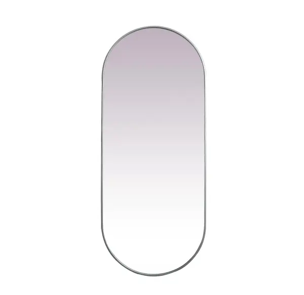 Instantly open up any space in your home with this minimalist wall-mounted mirror. Crafted of metal, this mirror strikes a pill-shaped silhouette. Its slender, clean-lined frame sports a classic finish, while the glass mirror within features a flat, for a brilliant reflection, letting the light bounce off to expand your space. Designed in a pill shape, this metal-frame mirror showcases in the three available satin finishes in black, brass, or silver. Mount this work of art in any room of your choice for added visual impact. Collection: Asha Rooms: living room, entryway, bathroom, office Finish: Silver Width: 1.00" Height: 72.00" Length: 30.00" Weight: 38.00 lb Material: iron and MDF Country of Origin: China Manufacturer Warranty: 1 year limited