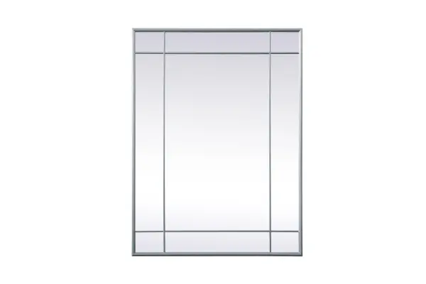 Our French panel mirror brings elegance to your living space with its timeless design, crafted from durable iron and high-quality glass. Its versatile hanging options allow you to place it horizontally or vertically, and the attached metal cleats simplify installation. Supported by a sturdy MDF backing, the mirror ensures stability, and its clear reflection without beveling makes it suitable for various settings. Beyond its decorative charm, it serves a practical purpose by enhancing natural light. With easy installation, this mirror is ideal for any room, adding a touch of charm and character. Its timeless aesthetic and clear, distortion-free vision make it a lasting and functional addition to your home. Collection: Viola Rooms: entry way, living room, dining room, bathroom, bedroom, office Finish: Silver Width: 40.00" Height: 1.00" Length: 30.00" Weight: 25.00 lb Material: Iron and MDF Country of Origin: China Manufacturer Warranty: 1 year limited