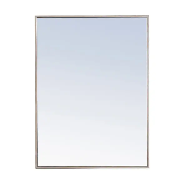 The classic clean and straight lines of this rectangular mirror in silver finish, slightly antiqued, provide you with a timeless and elegant look to accent any room or hallway in your home or office, featuring an ultra-thin metal frame in deep profile, refecting a minimalist's design and industrial styling. To ensure your home safety, we uses metal hanger bar that are securely welded to the back of the metal frame. We recommend using suitable heavy duty picture/mirror hooks, selecting the best type of fixing for the particular wall you wish to hang the mirror on, using the appropriate rawl plug if required. Measurement: 24x32, hang vertical or horizontal. Collection: Monet Rooms: living Room, Office, Bedroom, entry way, bathroom Finish: Silver Width: 1.00" Height: 32.00" Length: 24.00" Weight: 17.00 lb Extension from Wall: 0.16" Material: iron,glass, wood Country of Origin: China Manufacturer Warranty: 1 year limited Spec Sheet