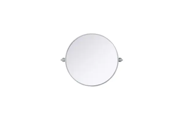 Elevate your space with the perfect blend of form and function—this sleek pivot mirror is designed to move with you. Crafted from durable iron with a sturdy MDF backing, it offers both stability and style. The 8-degree adjustable pivot allows for a customized viewing angle, making it ideal for bathrooms, bedrooms, and beyond. Finished with a hand-painted touch, this mirror is available in three elegant shades: black, silver, and brass, effortlessly complementing a range of interior aesthetics. Its modern round silhouette brings a timeless, minimalist appeal, making it a versatile piece for any room—whether placed in a living room, office, or entryway. Designed for effortless installation, this mirror comes with all necessary mounting brackets and screws, so you can upgrade your space in minutes. Whether you're seeking a functional bathroom essential or a sophisticated statement piece, this adjustable pivot mirror delivers in both style and practicality. Collection: Amoura Rooms: Bathroom Finish: Silver Width: 24.00" Height: 24.00" Weight: 10.00 lb Extension from Wall: 3.00" Material: Iron and MDF Country of Origin: China Safety Rating: Damp Manufacturer Warranty: 1 year limited