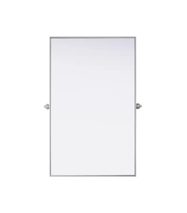 Upgrade your space with a modern pivot mirror that offers both form and function. Featuring an adjustable 8-degree tilt, this mirror allows you to customize your viewing angle for convenience and style. The iron frame with MDF backing ensures durability, while the hand-painted finish—available in black, silver, and brass—adds a touch of sophistication. Designed for versatility, this rectangular mirror can be mounted vertically or horizontally, making it the perfect fit for bathrooms, bedrooms, offices, and more. Its slim metal frame provides a sleek, contemporary aesthetic that blends seamlessly into various design styles. With included mounting brackets and screws, installation is simple and secure, giving your space an instant refresh. Whether you're getting ready for the day or enhancing your home décor, this pivot mirror delivers both style and practicality. Collection: Amoura Rooms: Bathroom Finish: Silver Width: 48.00" Height: 30.00" Weight: 30.00 lb Extension from Wall: 3.00" Material: Iron and MDF Country of Origin: China Safety Rating: Damp Manufacturer Warranty: 1 year limited