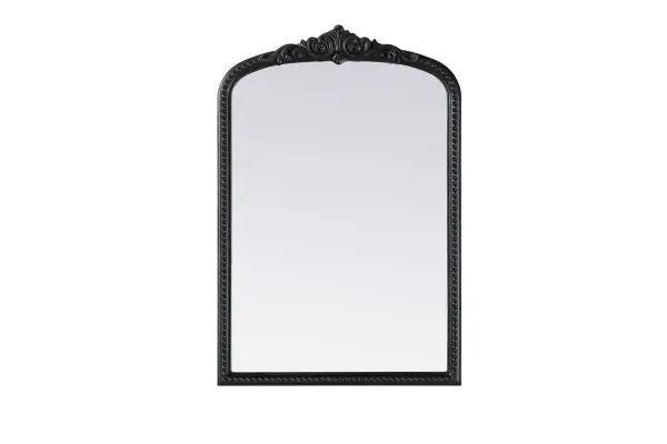 Bring classic charm and vintage character to your home with this arched wall mirror in a distressed vintage bronze finish. The hand-painted frame showcases ornate scroll and floral detailing, creating a refined, old-world aesthetic. Crafted from resin with an MDF backing board, this mirror is lightweight yet durable. Designed for vertical hanging only, it includes a metal inset hanger for easy installation (hardware not included). Whether placed above a fireplace mantel, in an entryway, or as an accent piece in a living room, this mirror enhances the space with its architectural beauty. Available in multiple sizes and an alternative antique brass finish, it is a versatile addition to classic, vintage, or French-inspired interiors. Collection: Naomi Rooms: entry way, living room, dining room, bedroom, office Finish: Vintage Bronze Width: 24.00" Height: 36.00" Weight: 17.00 lb Material: Resin Country of Origin: Vietnam Manufacturer Warranty: 1 year limited