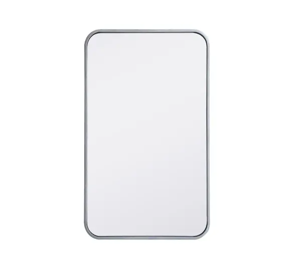 Enhance the appeal of your home or office with this modern mirror, featuring a thin rounded metal edges in a deep profile, reflecting a minimalist's design and trendy styling. To ensure your home safety, we used four metal hanger ring that are securely welded to the back of the metal frame , which sit on top of the frame for easy hanging. We recommend using suitable heavy duty picture/mirror hooks, selecting the best type of fixing for the particular wall you wish to hang the mirror on, using the appropriate rawl plug if required. Collection: Evermore Rooms: living room, entryway, bathroom, office Finish: Silver Width: 1.00" Height: 30.00" Length: 18.00" Weight: 10.00 lb Extension from Wall: 0.16" Material: iron and MDF Country of Origin: China Manufacturer Warranty: 1 year limited Spec Sheet