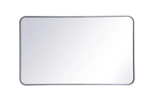 Enhance the appeal of your home or office with this modern mirror, featuring a thin rounded metal edges in a deep profile, reflecting a minimalist's design and trendy styling. To ensure your home safety, we used four metal hanger ring that are securely welded to the back of the metal frame , which sit on top of the frame for easy hanging. We recommend using suitable heavy duty picture/mirror hooks, selecting the best type of fixing for the particular wall you wish to hang the mirror on, using the appropriate rawl plug if required. Collection: Evermore Rooms: living room, entryway, bathroom, office Finish: Silver Width: 1.00" Height: 40.00" Length: 24.00" Weight: 18.00 lb Extension from Wall: 0.16" Material: iron and MDF Country of Origin: China Manufacturer Warranty: 1 year limited Spec Sheet