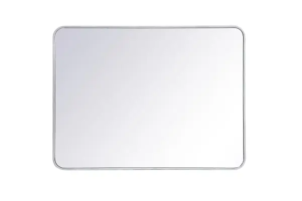 Enhance the appeal of your home or office with this modern mirror, featuring a thin rounded metal edges in a deep profile, reflecting a minimalist's design and trendy styling. To ensure your home safety, we used four metal hanger ring that are securely welded to the back of the metal frame , which sit on top of the frame for easy hanging. We recommend using suitable heavy duty picture/mirror hooks, selecting the best type of fixing for the particular wall you wish to hang the mirror on, using the appropriate rawl plug if required. Collection: Evermore Rooms: living room, entryway, bathroom, office Finish: Silver Width: 1.00" Height: 40.00" Length: 30.00" Weight: 26.00 lb Extension from Wall: 0.16" Material: iron and MDF Country of Origin: China Manufacturer Warranty: 1 year limited Spec Sheet