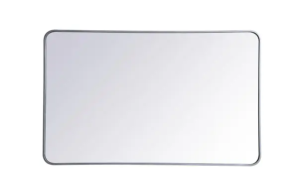 Enhance the appeal of your home or office with this modern mirror, featuring a thin rounded metal edges in a deep profile, reflecting a minimalist's design and trendy styling. To ensure your home safety, we used four metal hanger ring that are securely welded to the back of the metal frame , which sit on top of the frame for easy hanging. We recommend using suitable heavy duty picture/mirror hooks, selecting the best type of fixing for the particular wall you wish to hang the mirror on, using the appropriate rawl plug if required. Collection: Evermore Rooms: living room, entryway, bathroom, office Finish: Silver Width: 1.00" Height: 48.00" Length: 30.00" Weight: 31.00 lb Extension from Wall: 0.16" Material: iron and MDF Country of Origin: China Manufacturer Warranty: 1 year limited Spec Sheet