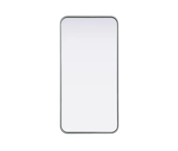 Elevate your home décor with this versatile wall mirror that combines functionality and modern design. Made from a sturdy combination of MDF, iron, and reflective mirror glass, this piece is built to last while adding a polished finish to any room. The extended depth of the frame not only provides a striking dimensional effect but also ensures the mirror's presence commands attention as a focal point. Whether you're decorating a bedroom, bathroom, or entryway, its diverse shapes—including rectangle and square—offer plenty of options to suit your style. The hand-painted black, brass, or silver finish brings a subtle yet striking touch, complemented by rounded corners for a smooth and contemporary aesthetic. With four metal inset hangers, it's ready to hang vertically or horizontally, ensuring flexibility for any layout. Available in multiple sizes, this mirror is a statement piece that blends seamlessly into both modern and classic spaces. Collection: Remy Rooms: Hallway, Living room, Bedroom, Entry Way, Office Finish: Silver Width: 18.00" Height: 36.00" Weight: 17.00 lb Extension from Wall: 2.00" Material: Iron and MDF Country of Origin: China Manufacturer Warranty: 1 year limited