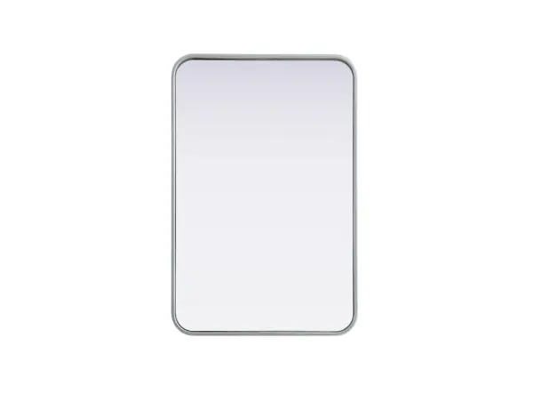 Elevate your home décor with this versatile wall mirror that combines functionality and modern design. Made from a sturdy combination of MDF, iron, and reflective mirror glass, this piece is built to last while adding a polished finish to any room. The extended depth of the frame not only provides a striking dimensional effect but also ensures the mirror's presence commands attention as a focal point. Whether you're decorating a bedroom, bathroom, or entryway, its diverse shapes—including rectangle and square—offer plenty of options to suit your style. The hand-painted black, brass, or silver finish brings a subtle yet striking touch, complemented by rounded corners for a smooth and contemporary aesthetic. With four metal inset hangers, it's ready to hang vertically or horizontally, ensuring flexibility for any layout. Available in multiple sizes, this mirror is a statement piece that blends seamlessly into both modern and classic spaces. Collection: Remy Rooms: Hallway, Living room, Bedroom, Entry Way, Office Finish: Silver Width: 20.00" Height: 30.00" Weight: 16.00 lb Extension from Wall: 2.00" Material: Iron and MDF Country of Origin: China Manufacturer Warranty: 1 year limited
