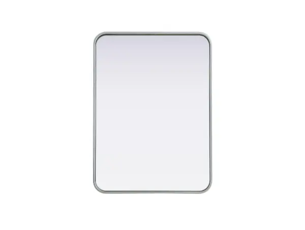 Elevate your home décor with this versatile wall mirror that combines functionality and modern design. Made from a sturdy combination of MDF, iron, and reflective mirror glass, this piece is built to last while adding a polished finish to any room. The extended depth of the frame not only provides a striking dimensional effect but also ensures the mirror's presence commands attention as a focal point. Whether you're decorating a bedroom, bathroom, or entryway, its diverse shapes—including rectangle and square—offer plenty of options to suit your style. The hand-painted black, brass, or silver finish brings a subtle yet striking touch, complemented by rounded corners for a smooth and contemporary aesthetic. With four metal inset hangers, it's ready to hang vertically or horizontally, ensuring flexibility for any layout. Available in multiple sizes, this mirror is a statement piece that blends seamlessly into both modern and classic spaces. Collection: Remy Rooms: Hallway, Living room, Bedroom, Entry Way, Office Finish: Silver Width: 22.00" Height: 30.00" Weight: 17.00 lb Extension from Wall: 2.00" Material: Iron and MDF Country of Origin: China Manufacturer Warranty: 1 year limited