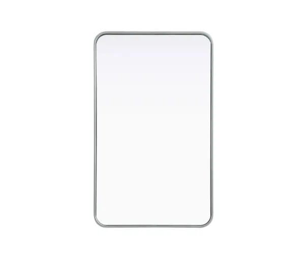 Elevate your home décor with this versatile wall mirror that combines functionality and modern design. Made from a sturdy combination of MDF, iron, and reflective mirror glass, this piece is built to last while adding a polished finish to any room. The extended depth of the frame not only provides a striking dimensional effect but also ensures the mirror's presence commands attention as a focal point. Whether you're decorating a bedroom, bathroom, or entryway, its diverse shapes—including rectangle and square—offer plenty of options to suit your style. The hand-painted black, brass, or silver finish brings a subtle yet striking touch, complemented by rounded corners for a smooth and contemporary aesthetic. With four metal inset hangers, it's ready to hang vertically or horizontally, ensuring flexibility for any layout. Available in multiple sizes, this mirror is a statement piece that blends seamlessly into both modern and classic spaces. Collection: Remy Rooms: Hallway, Living room, Bedroom, Entry Way, Office Finish: Silver Width: 22.00" Height: 36.00" Weight: 19.00 lb Extension from Wall: 2.00" Material: Iron and MDF Country of Origin: China Manufacturer Warranty: 1 year limited