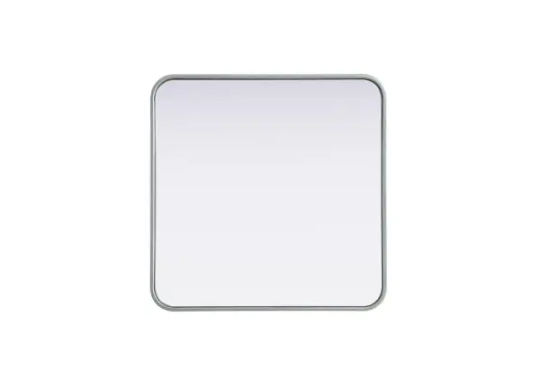 Elevate your home décor with this versatile wall mirror that combines functionality and modern design. Made from a sturdy combination of MDF, iron, and reflective mirror glass, this piece is built to last while adding a polished finish to any room. The extended depth of the frame not only provides a striking dimensional effect but also ensures the mirror's presence commands attention as a focal point. Whether you're decorating a bedroom, bathroom, or entryway, its diverse shapes—including rectangle and square—offer plenty of options to suit your style. The hand-painted black, brass, or silver finish brings a subtle yet striking touch, complemented by rounded corners for a smooth and contemporary aesthetic. With four metal inset hangers, it's ready to hang vertically or horizontally, ensuring flexibility for any layout. Available in multiple sizes, this mirror is a statement piece that blends seamlessly into both modern and classic spaces. Collection: Remy Rooms: Hallway, Living room, Bedroom, Entry Way, Office Finish: Silver Width: 24.00" Height: 24.00" Weight: 15.00 lb Extension from Wall: 2.00" Material: Iron and MDF Country of Origin: China Manufacturer Warranty: 1 year limited