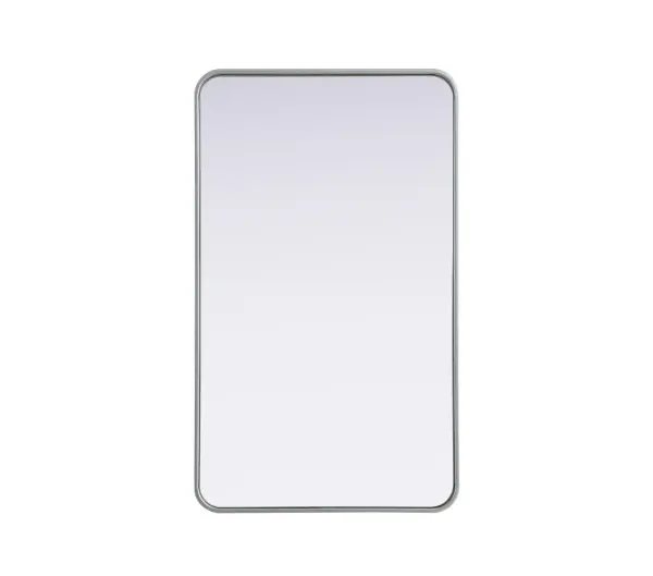Elevate your home décor with this versatile wall mirror that combines functionality and modern design. Made from a sturdy combination of MDF, iron, and reflective mirror glass, this piece is built to last while adding a polished finish to any room. The extended depth of the frame not only provides a striking dimensional effect but also ensures the mirror's presence commands attention as a focal point. Whether you're decorating a bedroom, bathroom, or entryway, its diverse shapes—including rectangle and square—offer plenty of options to suit your style. The hand-painted black, brass, or silver finish brings a subtle yet striking touch, complemented by rounded corners for a smooth and contemporary aesthetic. With four metal inset hangers, it's ready to hang vertically or horizontally, ensuring flexibility for any layout. Available in multiple sizes, this mirror is a statement piece that blends seamlessly into both modern and classic spaces. Collection: Remy Rooms: Hallway, Living room, Bedroom, Entry Way, Office Finish: Silver Width: 24.00" Height: 40.00" Weight: 24.00 lb Extension from Wall: 2.00" Material: Iron and MDF Country of Origin: China Manufacturer Warranty: 1 year limited