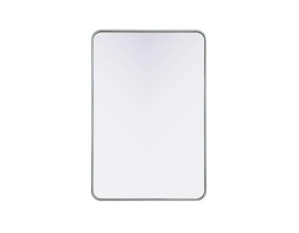 Elevate your home décor with this versatile wall mirror that combines functionality and modern design. Made from a sturdy combination of MDF, iron, and reflective mirror glass, this piece is built to last while adding a polished finish to any room. The extended depth of the frame not only provides a striking dimensional effect but also ensures the mirror's presence commands attention as a focal point. Whether you're decorating a bedroom, bathroom, or entryway, its diverse shapes—including rectangle and square—offer plenty of options to suit your style. The hand-painted black, brass, or silver finish brings a subtle yet striking touch, complemented by rounded corners for a smooth and contemporary aesthetic. With four metal inset hangers, it's ready to hang vertically or horizontally, ensuring flexibility for any layout. Available in multiple sizes, this mirror is a statement piece that blends seamlessly into both modern and classic spaces. Collection: Remy Rooms: Hallway, Living room, Bedroom, Entry Way, Office Finish: Silver Width: 27.00" Height: 40.00" Weight: 26.00 lb Extension from Wall: 2.00" Material: Iron and MDF Country of Origin: China Manufacturer Warranty: 1 year limited