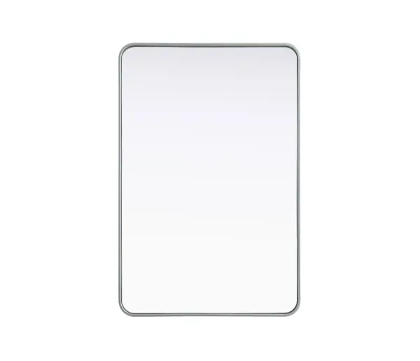 Elevate your home décor with this versatile wall mirror that combines functionality and modern design. Made from a sturdy combination of MDF, iron, and reflective mirror glass, this piece is built to last while adding a polished finish to any room. The extended depth of the frame not only provides a striking dimensional effect but also ensures the mirror's presence commands attention as a focal point. Whether you're decorating a bedroom, bathroom, or entryway, its diverse shapes—including rectangle and square—offer plenty of options to suit your style. The hand-painted black, brass, or silver finish brings a subtle yet striking touch, complemented by rounded corners for a smooth and contemporary aesthetic. With four metal inset hangers, it's ready to hang vertically or horizontally, ensuring flexibility for any layout. Available in multiple sizes, this mirror is a statement piece that blends seamlessly into both modern and classic spaces. Collection: Remy Rooms: Hallway, Living room, Bedroom, Entry Way, Office Finish: Silver Width: 28.00" Height: 42.00" Weight: 28.00 lb Extension from Wall: 2.00" Material: Iron and MDF Country of Origin: China Manufacturer Warranty: 1 year limited
