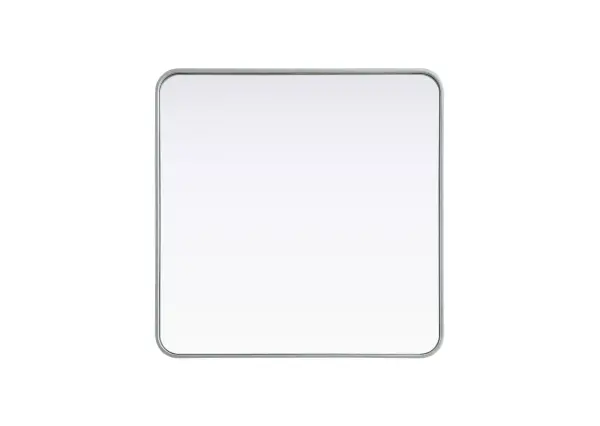 Elevate your home décor with this versatile wall mirror that combines functionality and modern design. Made from a sturdy combination of MDF, iron, and reflective mirror glass, this piece is built to last while adding a polished finish to any room. The extended depth of the frame not only provides a striking dimensional effect but also ensures the mirror's presence commands attention as a focal point. Whether you're decorating a bedroom, bathroom, or entryway, its diverse shapes—including rectangle and square—offer plenty of options to suit your style. The hand-painted black, brass, or silver finish brings a subtle yet striking touch, complemented by rounded corners for a smooth and contemporary aesthetic. With four metal inset hangers, it's ready to hang vertically or horizontally, ensuring flexibility for any layout. Available in multiple sizes, this mirror is a statement piece that blends seamlessly into both modern and classic spaces. Collection: Remy Rooms: Hallway, Living room, Bedroom, Entry Way, Office Finish: Silver Width: 30.00" Height: 30.00" Weight: 22.00 lb Extension from Wall: 2.00" Material: Iron and MDF Country of Origin: China Manufacturer Warranty: 1 year limited