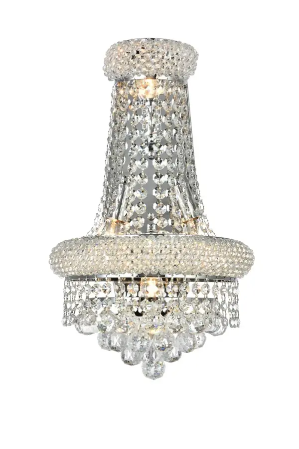 "Primo" means "first" in Italian, and the Primo wall sconces live up to their name as the top choice in classic, dramatic lighting. The gentle bell-shaped design adds graceful elegance to brighten any area of your home. A small ring on top, encrusted with crystals, holds strands of crystal octagons that flow outward to the larger bottom ring, laden with more crystals. Below that, this shimmering fixture culminates in descending layers of crystal octagons, balls, or drops, which come together with a Single ball at the bottom. Collection: Primo Rooms: Hallway, Living room, Bedroom, Bathroom, Entry Way, Finish: Chrome Crystal: clear Notes: Royal Cut Crystal (Clear) Width: 7.00" Height: 17.00" Length: 12.00" Weight: 8.00 lb Extension from Wall: 7.00" Wire: 11.81" Canopy: 6.1``x9.64`` Number of Bulbs: 4 Maximum Wattage: 40.00 W Bulb Type: B10 Bulb Base: E12 Dimmable Voltage: 110.00 V Material: Steel Country of Origin: China Safety Listing: ETL Safety Rating: Damp Title 20 Title 24 Manufacturer Warranty: 1 year limited