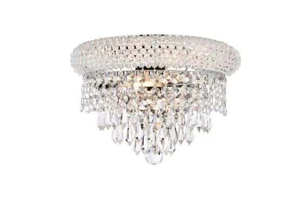 "Primo" means "first" in Italian, and the Primo wall sconces live up to their name as the top choice in classic, dramatic lighting. The gentle bell-shaped design adds graceful elegance to brighten any area of your home. A small ring on top, encrusted with crystals, holds strands of crystal octagons that flow outward to the larger bottom ring, laden with more crystals. Below that, this shimmering fixture culminates in descending layers of crystal octagons, balls, or drops, which come together with a Single ball at the bottom. Collection: Primo Rooms: Hallway, Living room, Bedroom, Bathroom, Entry Way, Finish: Chrome Crystal: clear Notes: Royal Cut Crystal (Clear) Width: 7.00" Height: 6.00" Length: 12.00" Weight: 4.00 lb Extension from Wall: 7.00" Wire: 11.81" Canopy: 5.11``x9.05`` Number of Bulbs: 2 Maximum Wattage: 40.00 W Bulb Type: B10 Bulb Base: E12 Dimmable Voltage: 110.00 V Material: Steel Country of Origin: China Safety Listing: ETL Safety Rating: Damp Title 20 Title 24 Manufacturer Warranty: 1 year limited