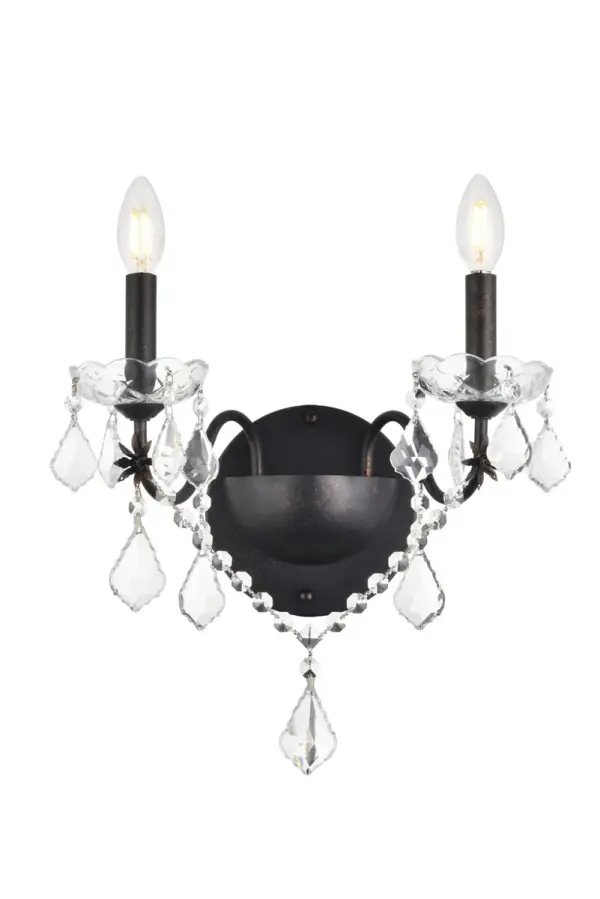 The St. Francis collection of sconces can add a brilliant touch of elegance and sophistication wherever they're placed. The fixtures feature graceful sweeping arms holding candelabra-style bulbs on delicate crystal bobèches, accented with crystal pendeloques, festoons, and beads. Available in a range of beautiful metal finishes and types of crystal, with your choice of two- or three-bulb styles (bulbs not included). Collection: St. Francis Rooms: Hallway, Living room, Bedroom, Bathroom, Entry Way, Finish: Dark Bronze Crystal: clear Notes: Royal Cut Crystal (Clear) Width: 8.00" Height: 15.00" Length: 13.00" Weight: 4.00 lb Extension from Wall: 8.00" Wire: 11.81" Canopy: 5.11``x0.98`` Number of Bulbs: 2 Maximum Wattage: 40.00 W Bulb Type: B10 Bulb Base: E12 Dimmable Voltage: 110.00 V Material: Steel Country of Origin: China Safety Listing: ETL Safety Rating: Damp Title 20 Title 24 Manufacturer Warranty: 1 year limited