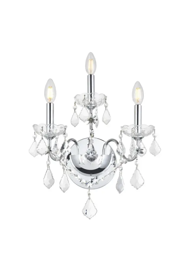 The St. Francis collection of sconces can add a brilliant touch of elegance and sophistication wherever they're placed. The fixtures feature graceful sweeping arms holding candelabra-style bulbs on delicate crystal bobèches, accented with crystal pendeloques, festoons, and beads. Available in a range of beautiful metal finishes and types of crystal, with your choice of two- or three-bulb styles (bulbs not included). Collection: St. Francis Rooms: Hallway, Living room, Bedroom, Bathroom, Entry Way, Finish: Chrome Crystal: clear Notes: Royal Cut Crystal (Clear) Width: 8.00" Height: 17.00" Length: 13.00" Weight: 5.00 lb Extension from Wall: 8.00" Wire: 11.81" Canopy: 5.11``x0.98`` Number of Bulbs: 3 Maximum Wattage: 40.00 W Bulb Type: B10 Bulb Base: E12 Dimmable Voltage: 110.00 V Material: Steel Country of Origin: China Safety Listing: ETL Safety Rating: Damp Title 20 Title 24 Manufacturer Warranty: 1 year limited