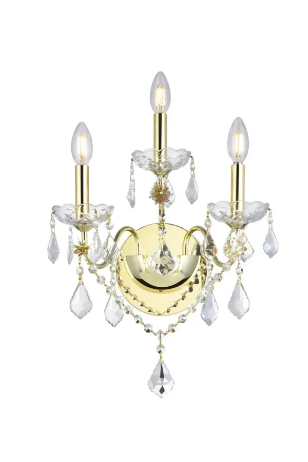 The St. Francis collection of sconces can add a brilliant touch of elegance and sophistication wherever they're placed. The fixtures feature graceful sweeping arms holding candelabra-style bulbs on delicate crystal bobèches, accented with crystal pendeloques, festoons, and beads. Available in a range of beautiful metal finishes and types of crystal, with your choice of two- or three-bulb styles (bulbs not included). Collection: St. Francis Rooms: Hallway, Living room, Bedroom, Bathroom, Entry Way, Finish: Gold Crystal: clear Notes: Royal Cut Crystal (Clear) Width: 8.00" Height: 17.00" Length: 13.00" Weight: 5.00 lb Extension from Wall: 8.00" Wire: 11.81" Canopy: 5.11``x0.98`` Number of Bulbs: 3 Maximum Wattage: 40.00 W Bulb Type: B10 Bulb Base: E12 Dimmable Voltage: 110.00 V Material: Steel Country of Origin: China Safety Listing: ETL Safety Rating: Damp Title 20 Title 24 Manufacturer Warranty: 1 year limited