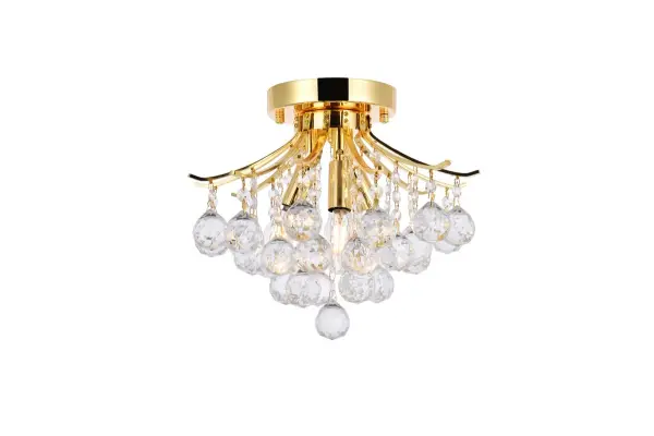 A blaze of radiance, Toureg collection flush mounts gleam with a shower of brilliant crystals. Elegant curved arms radiate from a steel frame available in chrome or gold finishes. A choice of clear crystal octagons and faceted crystal balls make it a dazzling choice for a kitchen, dining room, or bedroom. Collection: Toureg Rooms: Dining room, Living room, Bedroom, Bathroom, Entry Way, Closet Finish: Gold Crystal: clear Notes: Royal Cut Crystal (Clear) Width: 12.00" Height: 12.00" Length: 12.00" Weight: 17.00 lb Wire: 11.81" Canopy: 5.9"x0.98" Number of Bulbs: 3 Maximum Wattage: 40.00 W Bulb Type: B10 Bulb Base: E12 Dimmable Voltage: 110.00 V Material: Steel Country of Origin: China Safety Listing: ETL Safety Rating: UL,ULC Manufacturer Warranty: 1 year limited