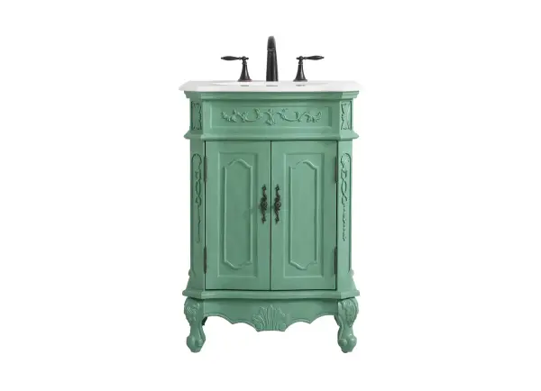 This superb balance of timeless tradition and opulent beauty in a engineered marble-topped vanity will certainly enhance the aesthetics of any home or office bathroom! Featuring an ivory white durable engineered marble countertop complimenting the hand painted cabinet with a delicate carved floral design, stands on stylishly carved solid wood French scroll feet. Don't let the design fool you, the engineered marble countertop and porcelain undermount sink allows for space to get ready, while the antique bronze hardware allows you to discover storage spaces with ease. You and your guests will marvel at this vanity that will both store away your bathroom essentials and enhance the aesthetics of your room. Collection: Danville Rooms: Bathroom Finish: Vintage mint Width: 21.00" Height: 36.00" Length: 24.00" Weight: 86.00 lb Material: Solid wood and MDF Country of Origin: Vietnam Manufacturer Warranty: 1 year limited