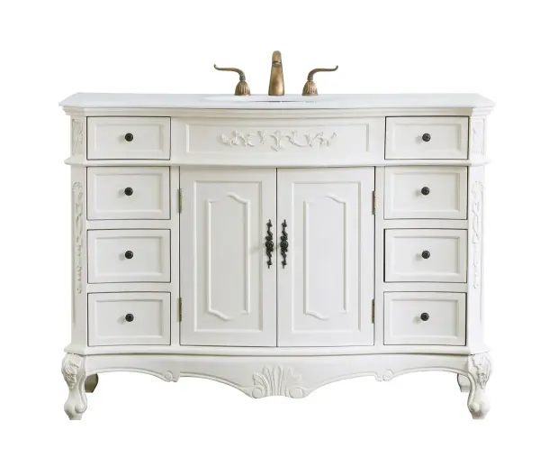 This superb balance of timeless tradition and opulent beauty in a engineered marble-topped vanity will certainly enhance the aesthetics of any home or office bathroom! Featuring an ivory white durable engineered marble countertop complimenting the hand painted cabinet with a delicate carved floral design, stands on stylishly carved solid wood French scroll feet. Don't let the design fool you, the engineered marble countertop and porcelain undermount sink allows for space to get ready, while the antique bronze hardware allows you to discover storage spaces with ease. You and your guests will marvel at this vanity that will both store away your bathroom essentials and enhance the aesthetics of your room. Collection: Danville Rooms: Bathroom Finish: Antique white Width: 21.00" Height: 36.00" Length: 48.00" Weight: 174.00 lb Material: Solid wood and MDF Country of Origin: Vietnam Manufacturer Warranty: 1 year limited