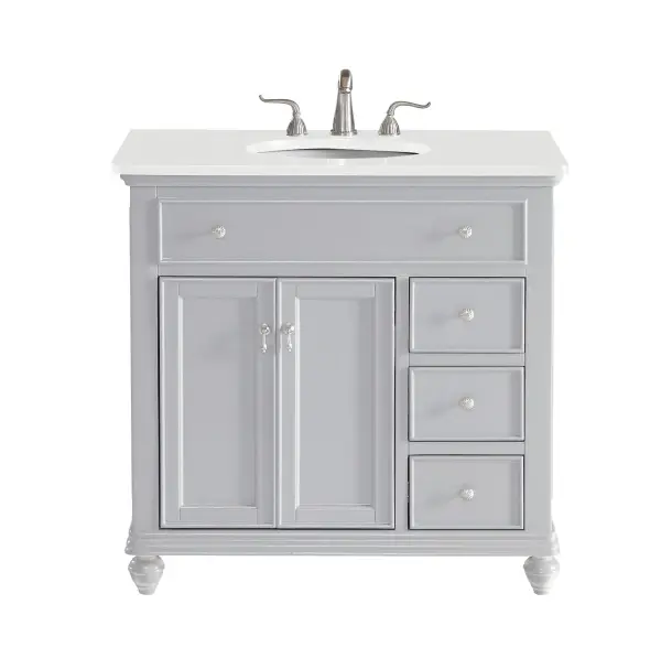 Dimensions
Length: 36"
Width: 21"
Height: 35"
Counter Top Length: 36"
Counter Top Width: 21"
Counter Top Height: 0.75"
Sink Width: 15.38"
Sink Depth: 12.25"
Sink Height: 7"
Sink Drain Hole Size: 1.75"
Faucet Hole Spacing: 8"3 Holes"
Specifications
Assembly Required: YES
Base Material: Solid wood and MDF
Counter Top Edge Style: straight
Counter Top Finish: Ivory white
Distressed Finish: NO
Finish (Color): Grey
Fixture Material: Solid Wood and MDF
Hardware Finish: Brushed nickel
Harware Material: Aluminum alloy
Number of Faucet Holes: 3
Number of Sinks: 1
Product Shape: Rectangle
Product Type: Bathroom Vanities
Product Warranty: 1 year limited
Sink Mounting Type: Undermount
Vanity Backsplash: NO
Vanity Mounting Type: Free-Standing
Weight: 136
Wire Included: No
Wood Type: birch
Shipment type: LTL
US Shipping Cost: $152.00
Drawers
Drawers Included: yes
Number of Drawers: 3
False Drawers: yes
Drawer Width: 9.25
Drawer Depth: 14.25
Drawer Height: 6
Drawer Handle Designs: knobs
Shelves
Number of Shelves: 1
Shelf Width: 18.75
Cabinets
Number of Cabinets: 1
Cabinet Interior Width: 18.75
Cabinet Interior Depth: 18.125
Cabinet Interior Height: 20.125