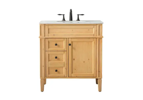 This compact vanity combines classic elegance with practical design. The handpainted natural wood cabinet pairs beautifully with a genuine Carrara white marble top and undermount porcelain sink. Perfect for smaller bathrooms.