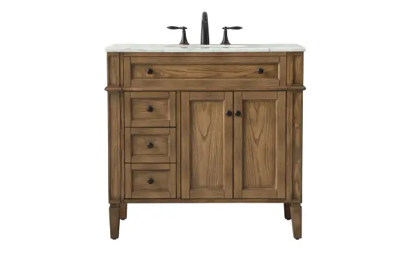 This handpainted vanity combines natural stone elegance with practical storage. The Carrara white marble top and undermount porcelain sink create a spa-like aesthetic, while the driftwood finish adds coastal charm.
