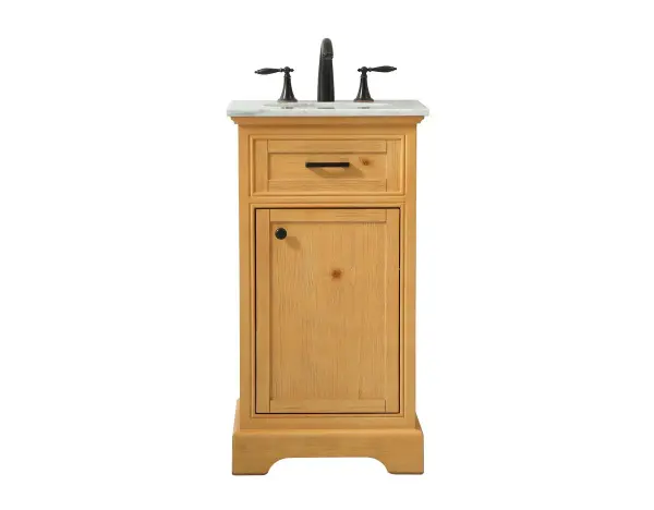Clean lines and classic form can truly add a fresh look to your bathroom or powder room. This vanity, complemented by round hardware, will surely charm you with its confident style and subtle charisma. This vanity can store all of your bathroom toiletries, from extra towels to make up essentials. The vanity is crowned with carrara white marble and includes a porcelain undermount sink--adding both function and form that will truly amaze. Collection: Americana Rooms: bathroom Finish: natural wood Width: 19.00" Height: 35.00" Length: 19.00" Weight: 65.00 lb Material: Solid wood and MDF Country of Origin: Vietnam Manufacturer Warranty: 1 year limited