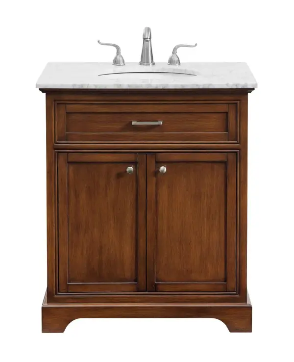 From its Italian Carrara white marble top to its contemporary-styled hand painted teakwood cabinet, this member of our "Americana" vanity collection is sure to enhance either your home or office bathroom. Beneath its lustrous, natural marble top and an oval, white porcelain under mount sink, a handsome 2-door cabinet with a Single shelf for all your bathroom essentials, highlighted with recessed panel doors, brushed steel bar handle and knobs, stands on strong solid pedestal feet. A wonderful balance of simplicity and practical function! Measurements: W30"xD21.5"xH35" Collection: Americana Finish: Teak Width: 21.50" Height: 35.00" Length: 30.00" Weight: 106.00 lb Material: Solid wood and MDF Country of Origin: Vietnam Manufacturer Warranty: 1 year limited Spec Sheet